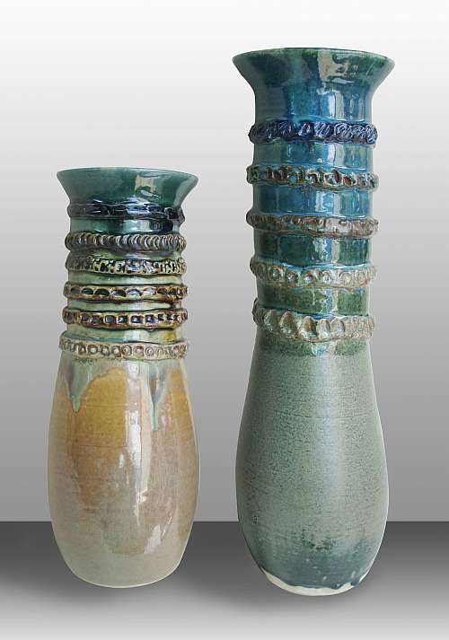  Two tall vases with applied bands.